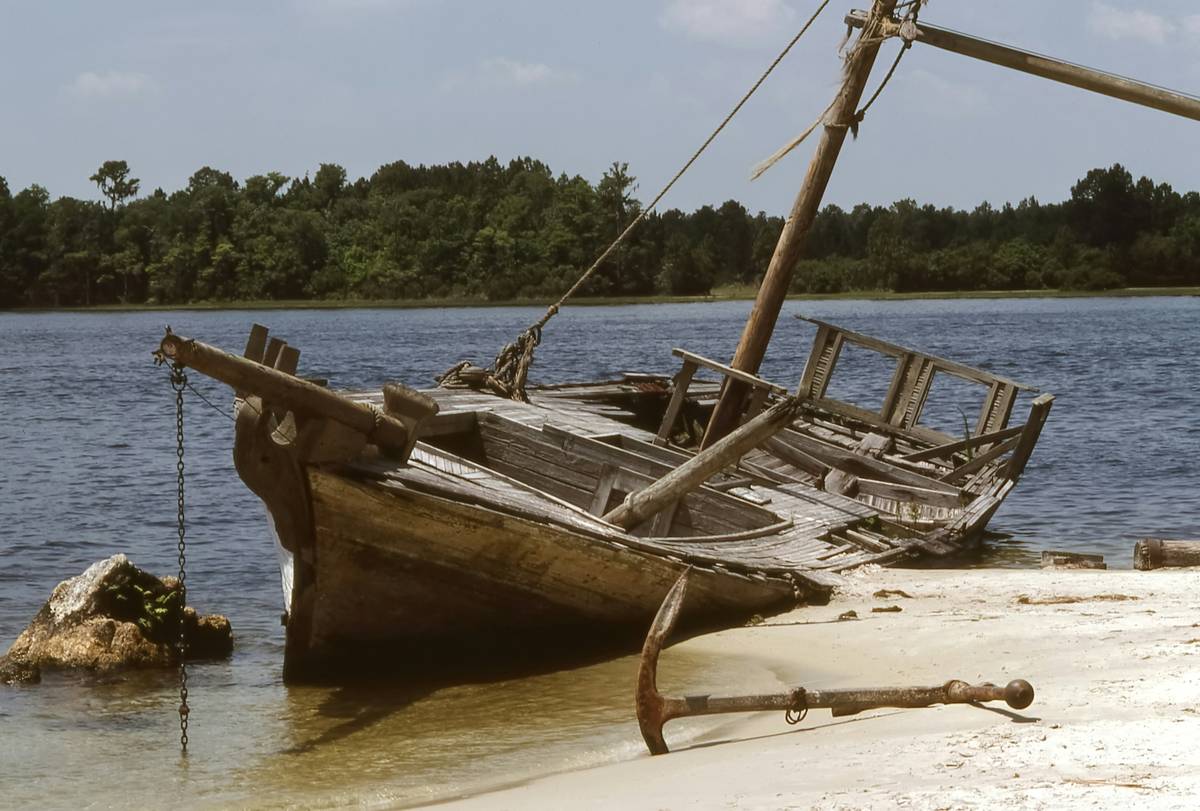 A stranded boater signaling for help