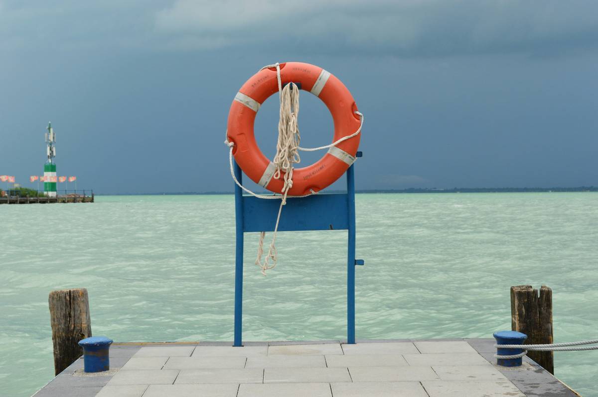 A damaged rental boat on shore